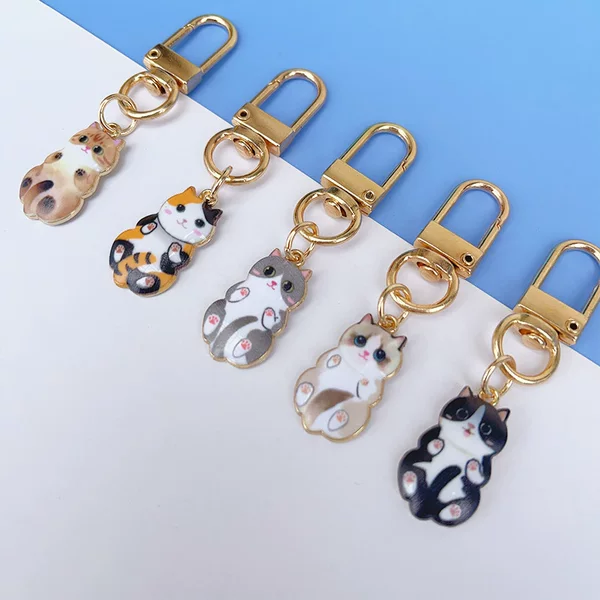 Cross-Border Leopard Print Alloy Cat Keychain Small Pendant Creative Cute Mini Bag Headphone Cover Decorative Hanging Jewelry