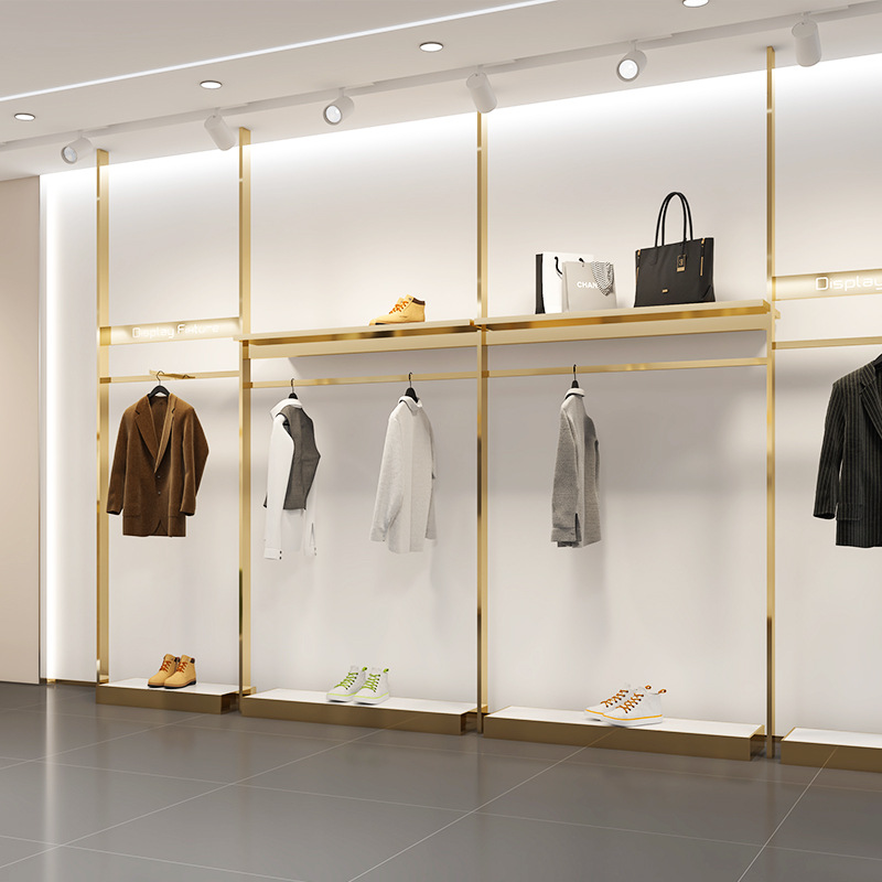Estantes de ropa de hombre de acero inoxidable en la pared columnas del cielo simple cabina de exhibición de ropa tienda de ropa estante de exhibición estante oro