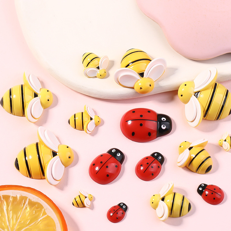 Resina accesorios de dibujos animados abeja tocado DIY accesorios de la joyería niños horquilla crema epoxi teléfono caso parche