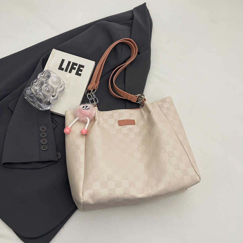 Bolsa de hombro a cuadrillas de alto nivel 2024, nueva bolsa de viaje simple de gran capacidad para estudiantes universitarios.