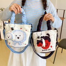 手抄画涂鸦手提包包女新款韩版休闲单肩包日系卡通印花斜挎包