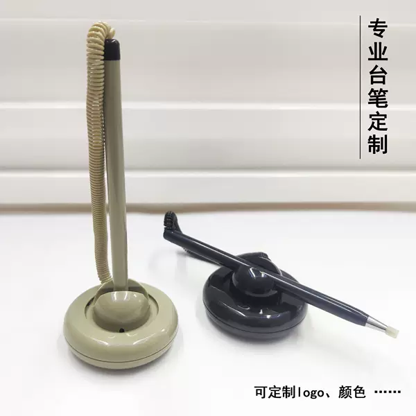 Spring-loaded pen holder for reception desks, featuring a circular design, fixed positioning to prevent loss, customizable logo, and replaceable ink cartridges