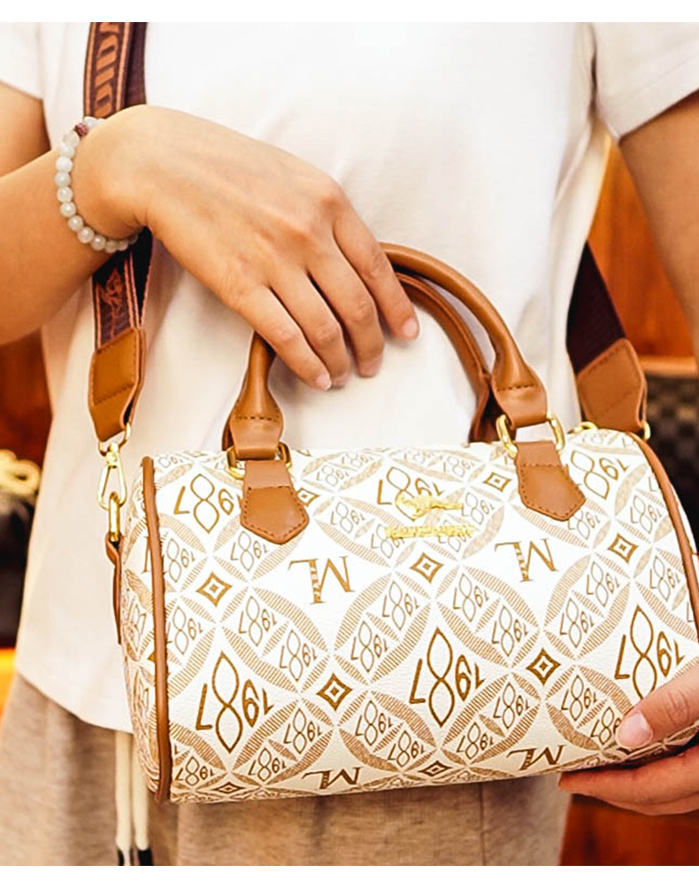 This year's popular cross-border handbag for women is the 2024 new printed letter texture light luxury Boston handbag and single-shoulder bag undefined