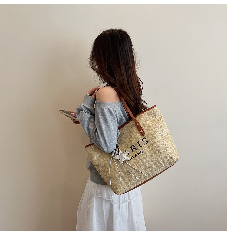 Summer striped woven large-capacity tote bag 2025 New style fashionable and trendy Korean style simple and elegant casual single-shoulder bag undefined