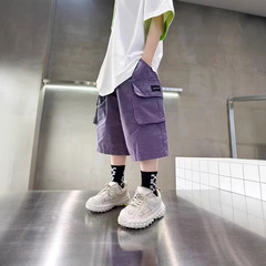 夏の子供の薄いタイプの5分のズボンの中で大きい子供の工装のズボンのファッション的な洋風のゆったりしているズボンの男の子の半ズボンは湿っていて外に着ます。