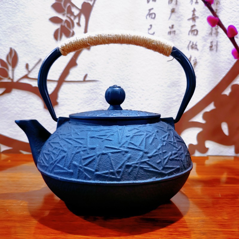 Estufa té hirviendo tetera de hierro fundido juego de té estilo japonés olla de hierro de cerdo olla de haz olla de gran altura tetera traje al por mayor