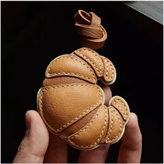 牛の角のカバンは本革のペンダントを掛けます。