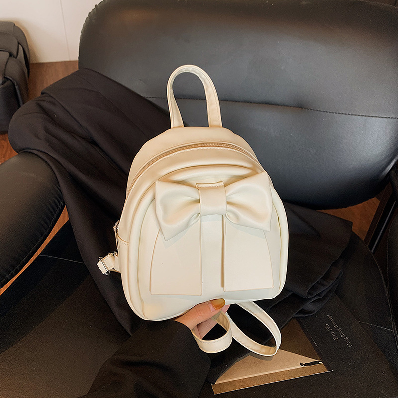 Lindo bolso pequeño con lazo simple 2025 verano nuevo estilo diseño sentido mochila pequeña moda estilo occidental mochila salvaje