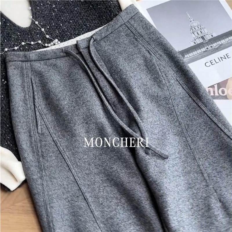Highly recommended! Gray, tailored wool wide-leg pants for women, a new and fashionable autumn style with a cinched waist and drawstring, featuring a curved-leg design Highly recommended! Gray, tailored wool wide-leg pants for women, a new and fashionable autumn style with a cinched waist and drawstring, featuring a curved-leg design