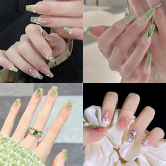 Fashionable nail art for influencers on Instagram, featuring color-changing pink diamond-studded removable nail stickers, perfect for dancers and brides.
