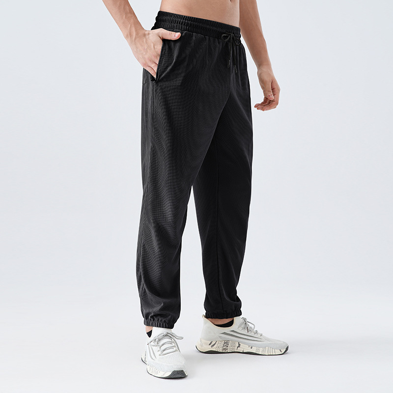 Pantalones deportivos de tejido para hombres respirantes absorbientes de humedad secado rápido entrenamiento de maratón de atletismo para correr pantalones casuales