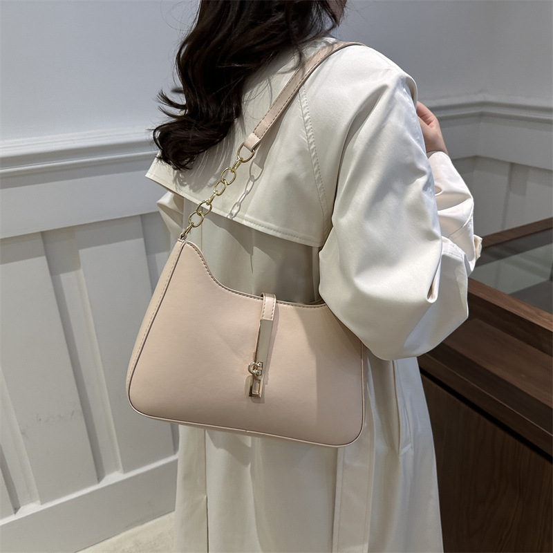 Bolso de alta sensación 2024, nuevo bolso de moda, primavera y verano, simple y versátil bolso de hombro de transporte, bolso de nicho de textura bajo la axila