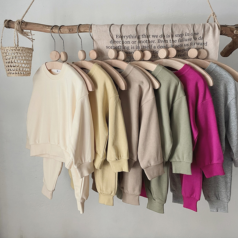 Los niños de algodón de felpa de dopamina de color sólido de los hombres y las mujeres jersey de cuello redondo suéter abrigo pantalones de dos piezas conjunto