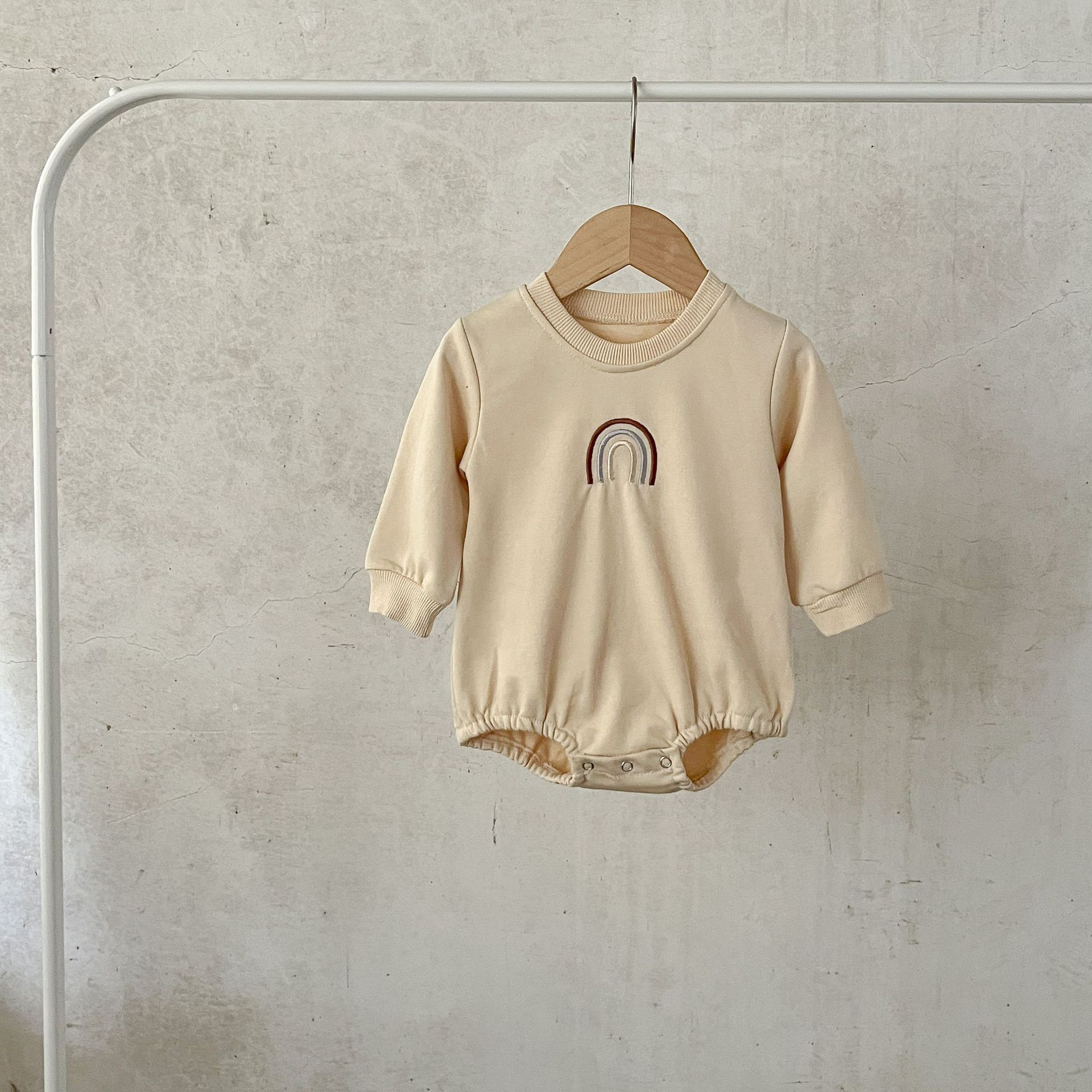 INS estilo coreano bebé niños y niñas suéter de algodón Arco Iris bordado mono mameluco recién nacido mameluco suelto moda