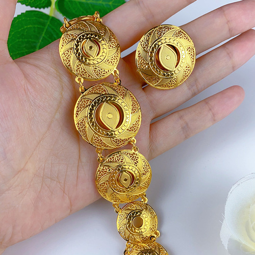 Best-selling open-mouth copper bracelet and ring set, Dubai bride gold-plated hollow bracelet and ring accessory wholesale