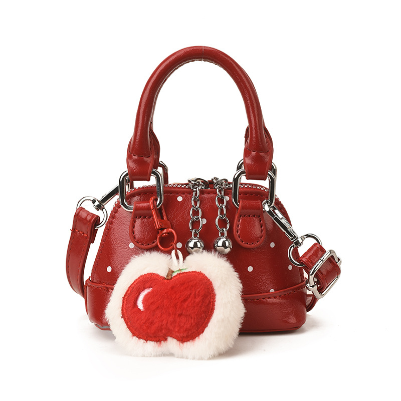 Bolsas coreanas para niños y niñas, bolsas de conchas, bolsas de mano de manzana, bolsas para niños, bolsas de comercio exterior transfronterizas 2026