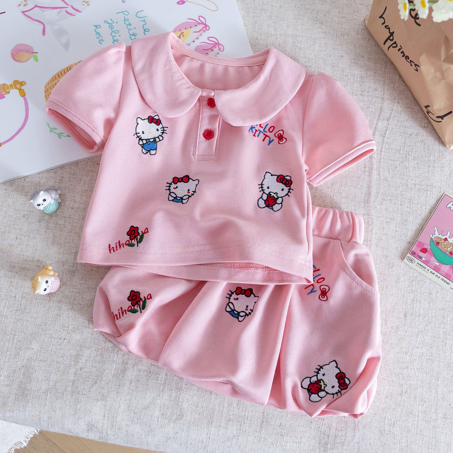 女の子の夏のスーツ2025の新型の洋気の子供のかわいい漫画のプリントの半袖のtシャツの格子のつぼみのスカート