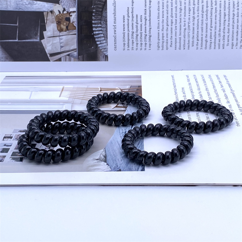 Triángulo gran teléfono bobina banda de pelo cuerda banda de goma mujer lazo de pelo un yuan dos yuanes tienda accesorios para el pelo accesorios cabeza