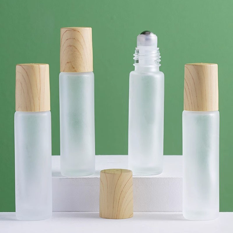 Cubierta de grano de madera botella de rodillo botella de aceite esencial de vidrio esmerilado 5ml10ml cosmético sub-embalaje botella de cuentas pequeña botella de muestra al por mayor