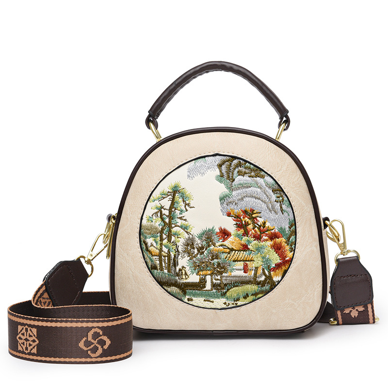 Transfronterizos ocio de cuero suave bolsas redondas versátiles exquisitas retro bolsas de hombro inclinadas de gran capacidad nuevas bolsas de mamá chinas