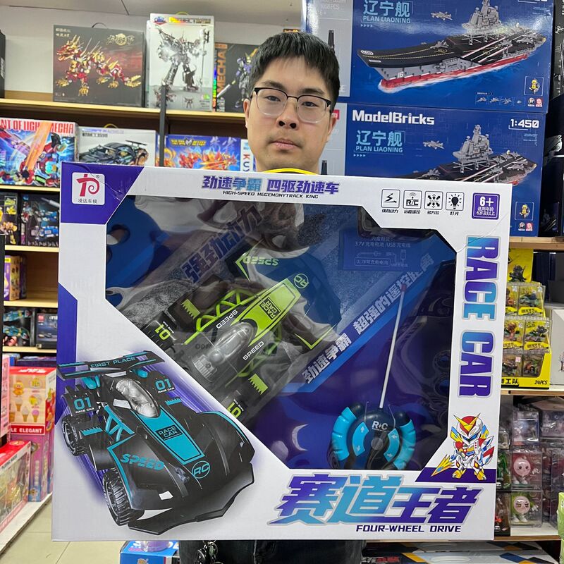 Children's four-wheel drive remote control racing model rotating stunt car toy simulation outdoor climbing car toy gift box