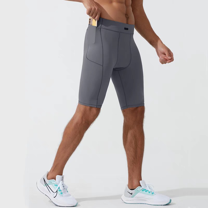 Correr pantalones cortos de compresión para hombres profesionales de maratón de carreras a través de la carretera rápido secado ajustado pantalones de cinco puntos bolsillo puede poner el teléfono móvil