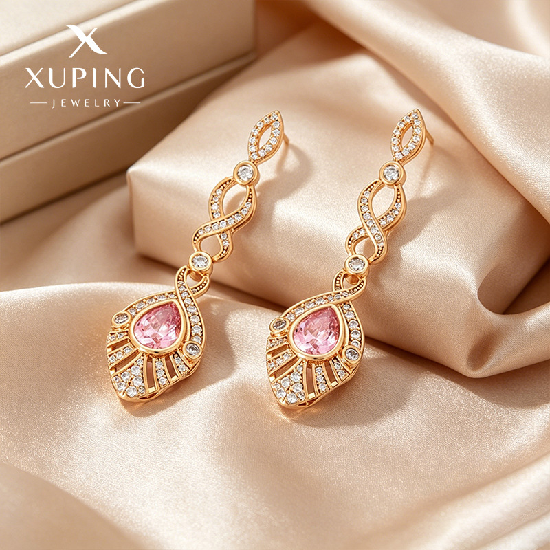 Xuping Caibao serie de aretes de gota de agua ligero lujo temperamento pendientes de cobre aleación de aretes de viento retro al por mayor mujeres