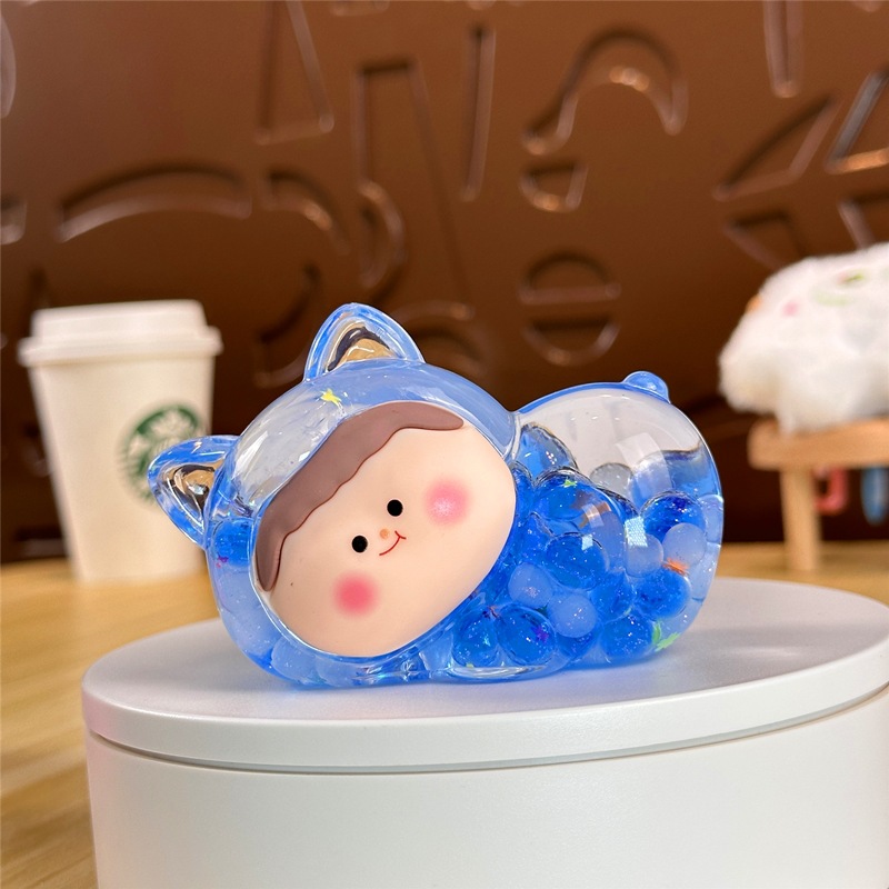Nocturno explosivo gato macarón super lindo dibujos animados arena flotante en aceite caja ciega pequeña bolsa ciega adornos al por mayor