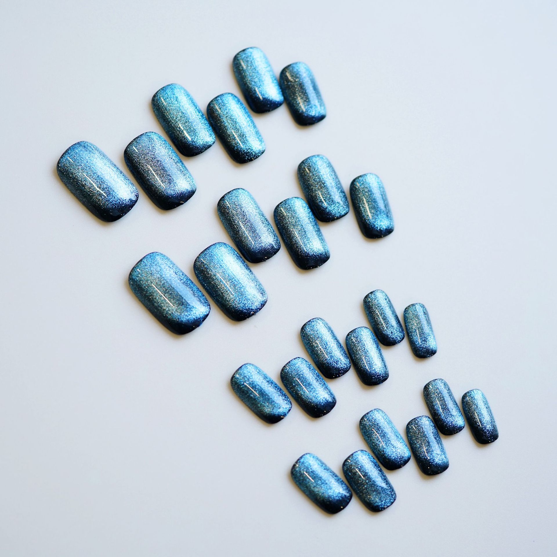 DY-53 azul y negro ojo de gato falso pieza de uñas fototerapia desgaste hecho a mano pegatina de uñas terminado pieza de belleza de uñas pieza de uñas al por mayor