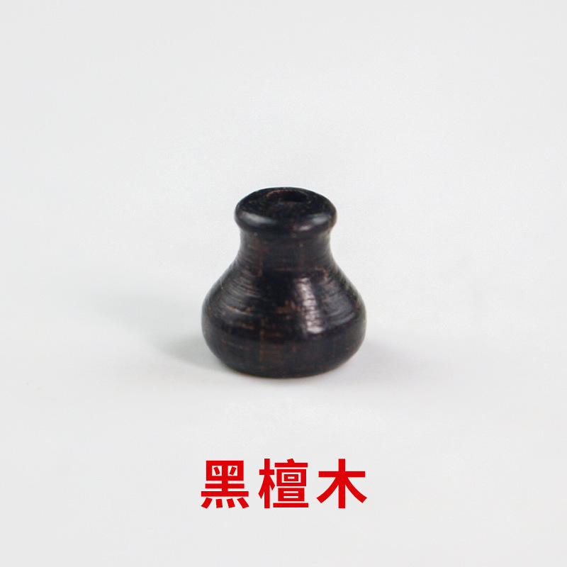 Fábrica al por mayor cuentas de madera cuentas sueltas accesorios de joyería DIY material cuentas de madera redondas procesamiento de sándalo púrpura cuentas de madera de ébano