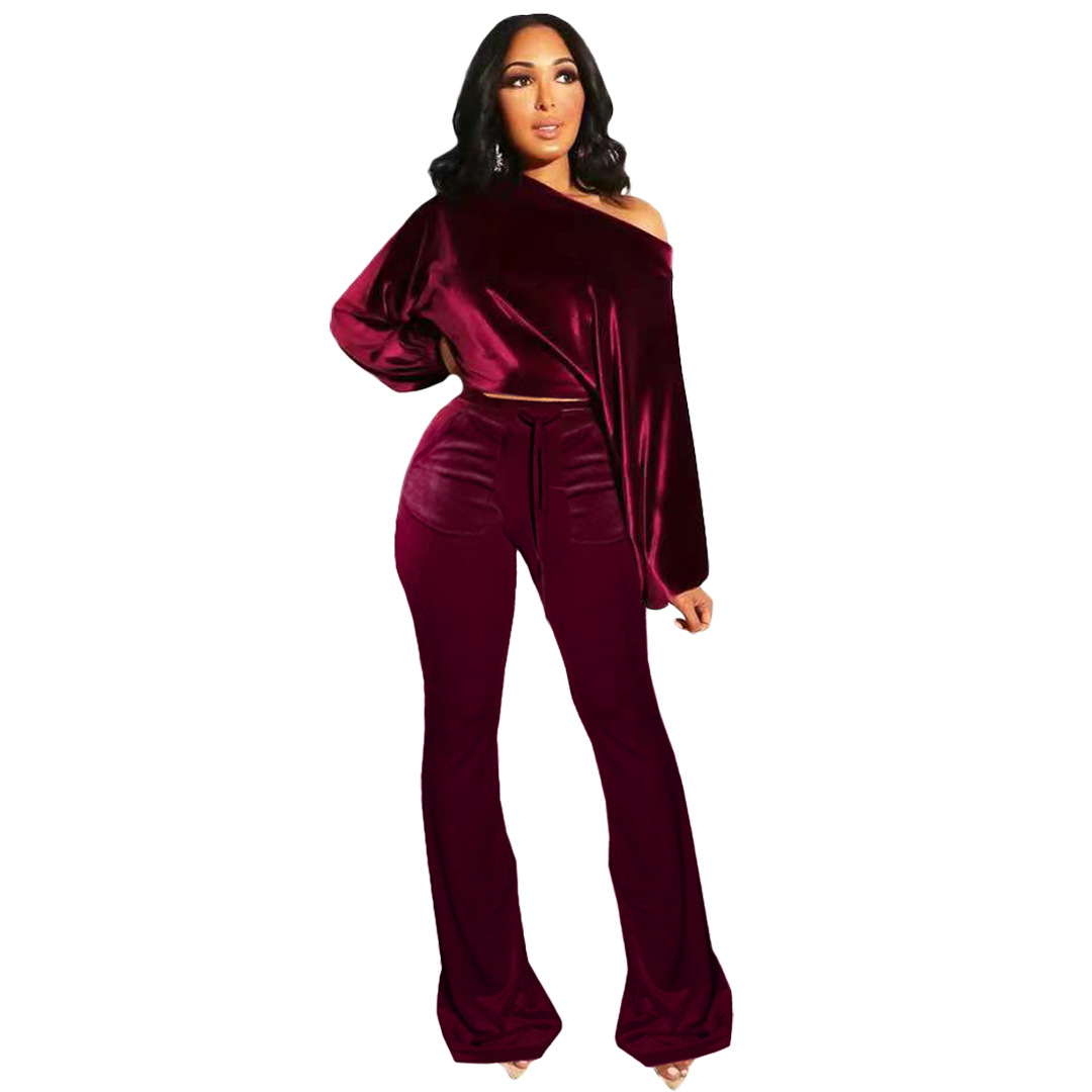 solid color one-shoulder top bell bottoms two-piece set nihaostyles clothing wholesale NSOJS83461