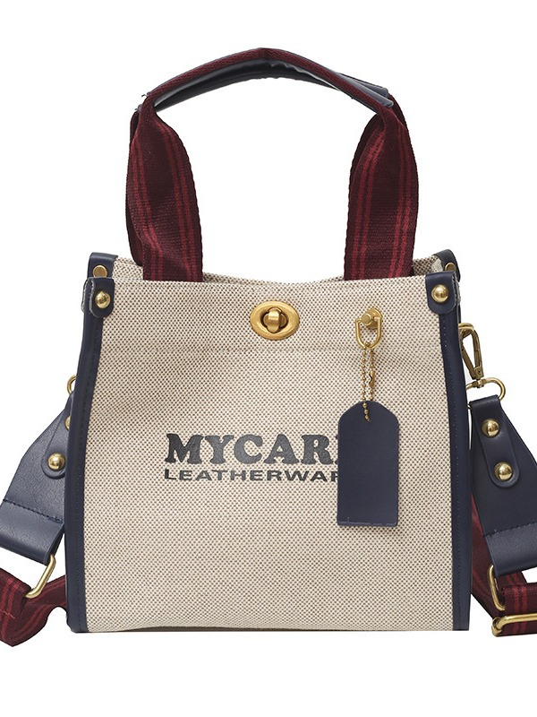 Bolsa de mano de lona de gran capacidad para mujeres 2024 nueva moda impresa letras mochilas bolsa de viaje casual