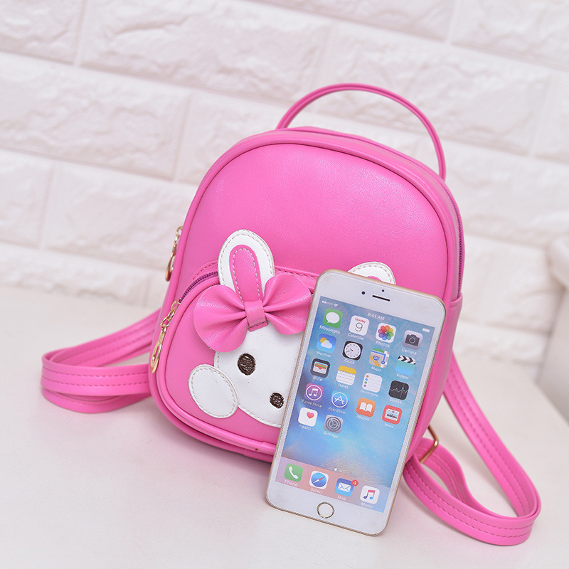 Versión coreana para niños de moda mini mochila princesa niña linda mochila de cuero jardín de infantes dibujos animados salida pequeña mochila escolar