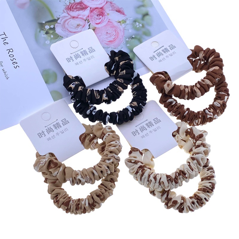 Montado en la tarjeta leche té color amor oso intestino grueso banda de pelo de las mujeres corbata de pelo cabeza cuerda banda de goma dos yuanes tienda de joyería