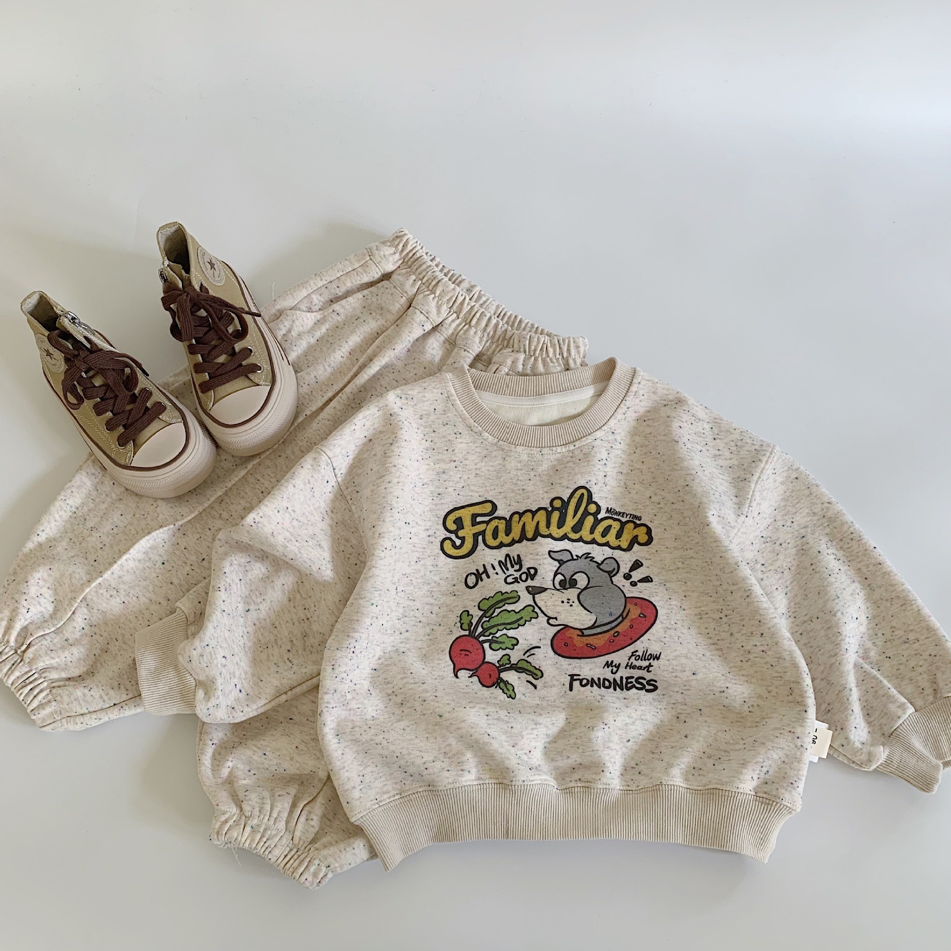 Mei Bao conjunto de niños 2025 primavera y otoño nuevos productos de color pequeño chaqueta de dibujos animados + pantalones casuales de dos piezas