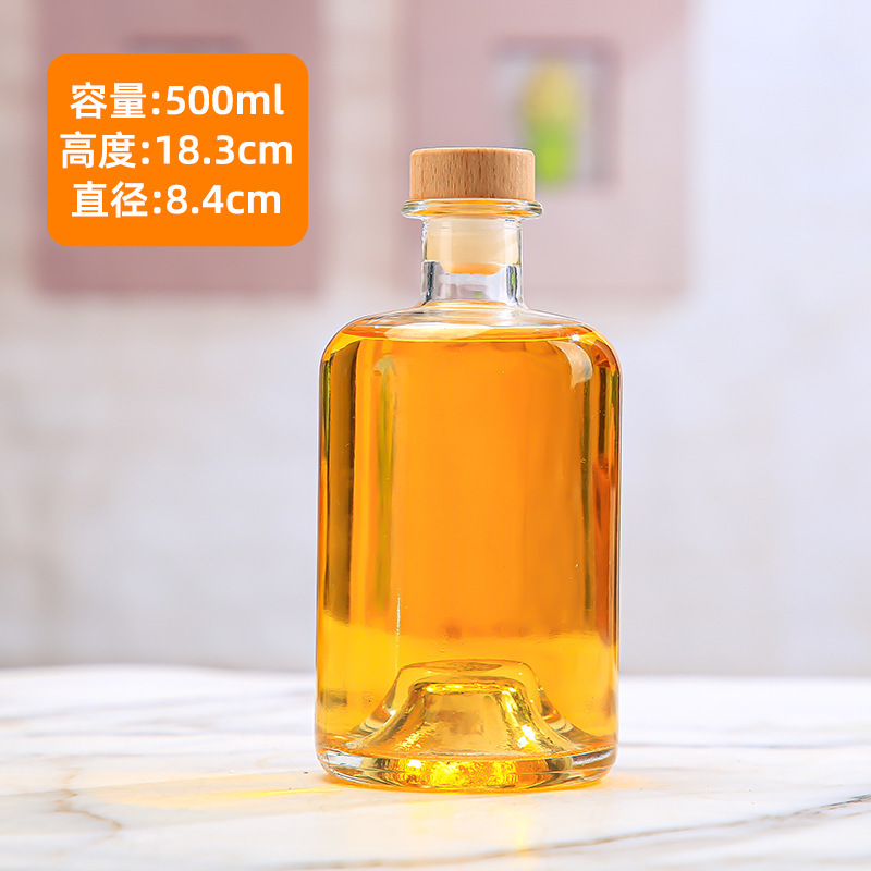 Botella de vodka al por mayor Botella de vino de fondo cóncavo Botella de vino extranjero Botella de vino amarillo de gran capacidad Botella de vino de ciruela transparente Botella de vino de frutas de vidrio