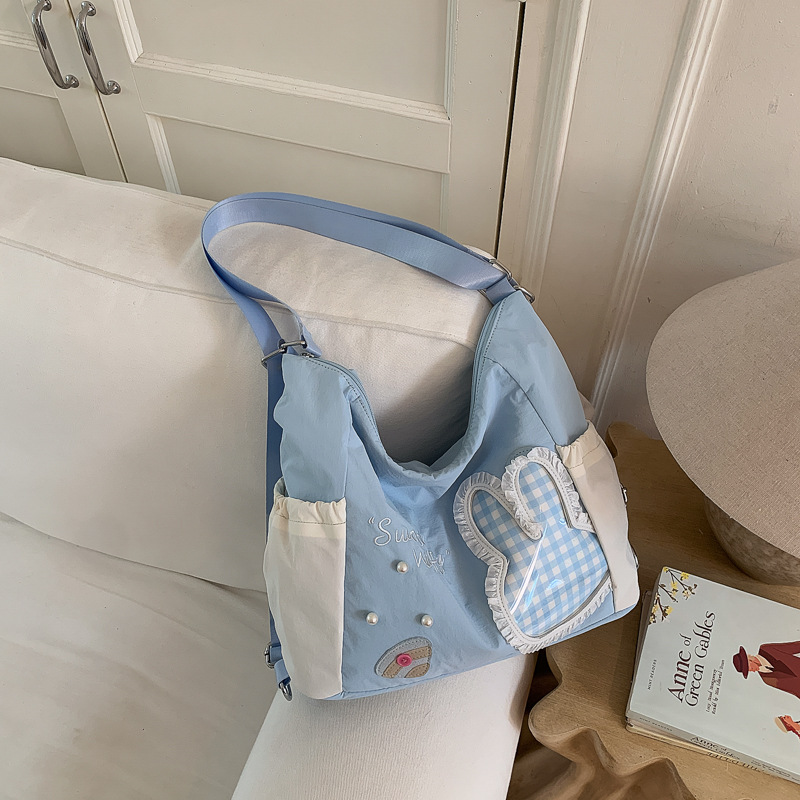 Bolsa multipropósito de dibujos animados coreanos para mujeres verano 2026 nueva moda dulce mochila de hombro de viaje bolsa de ocio image 8