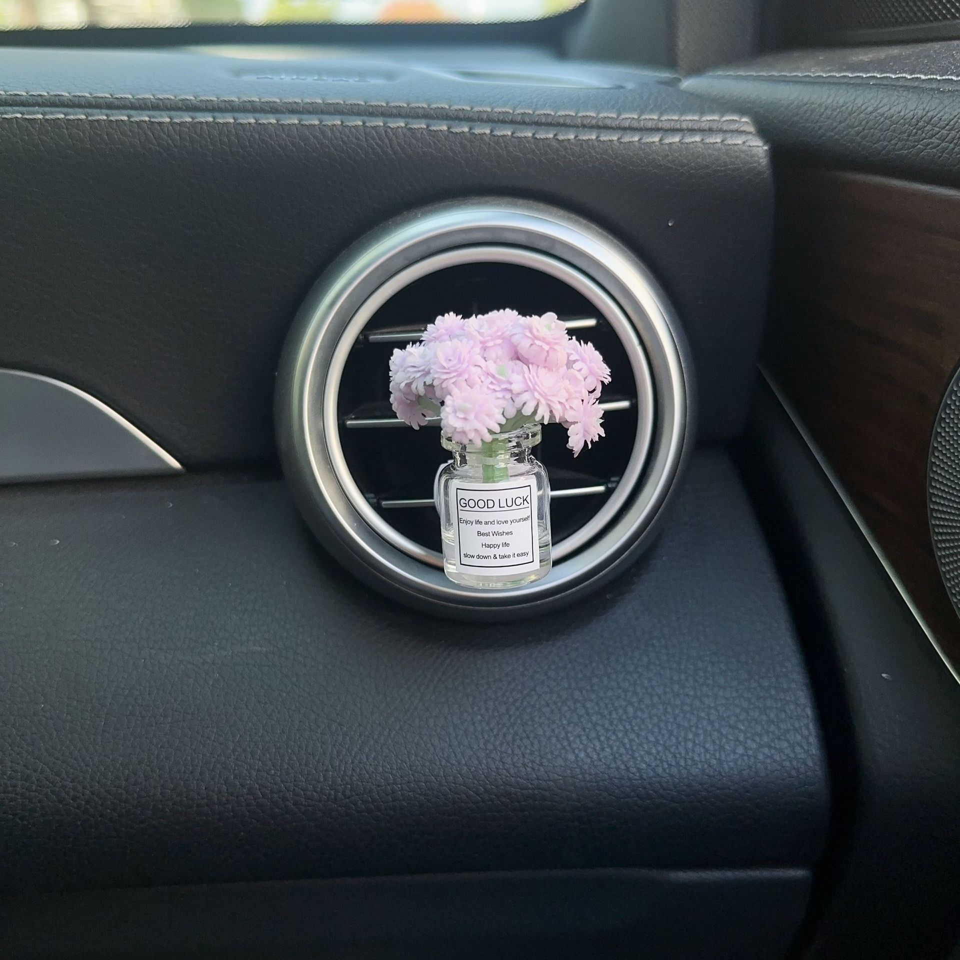 Decoración creativa de salida de aire del automóvil con flores de estrellas pequeñas frescas aire acondicionado botella de perfume de perfumes