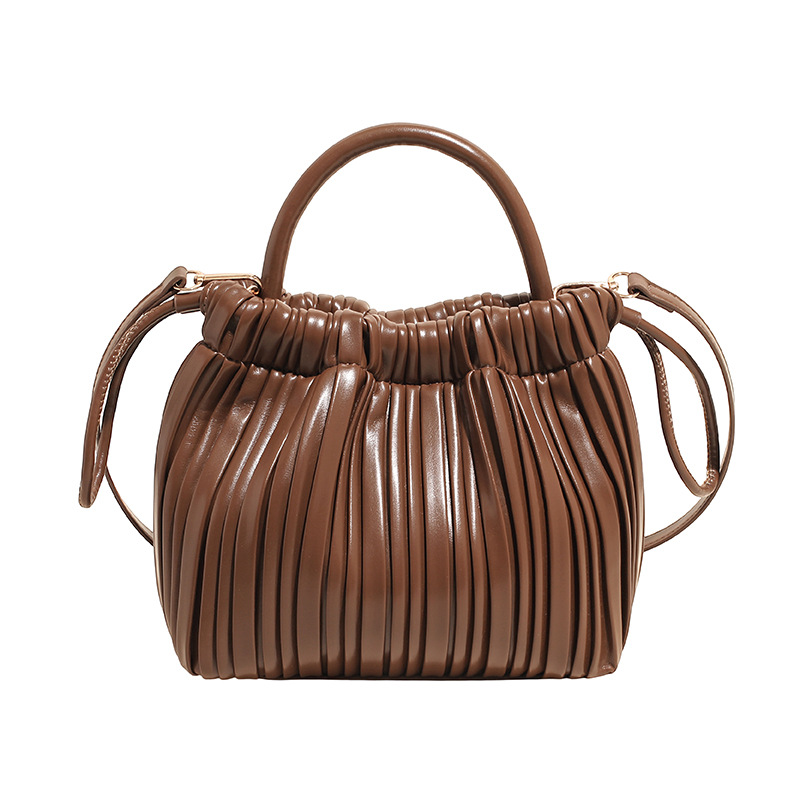 2025 otoño y invierno nuevo bolso plegable bolso de cubo de cuerda de tracción universal bolso de hombro de moda de mujer bolso de viaje