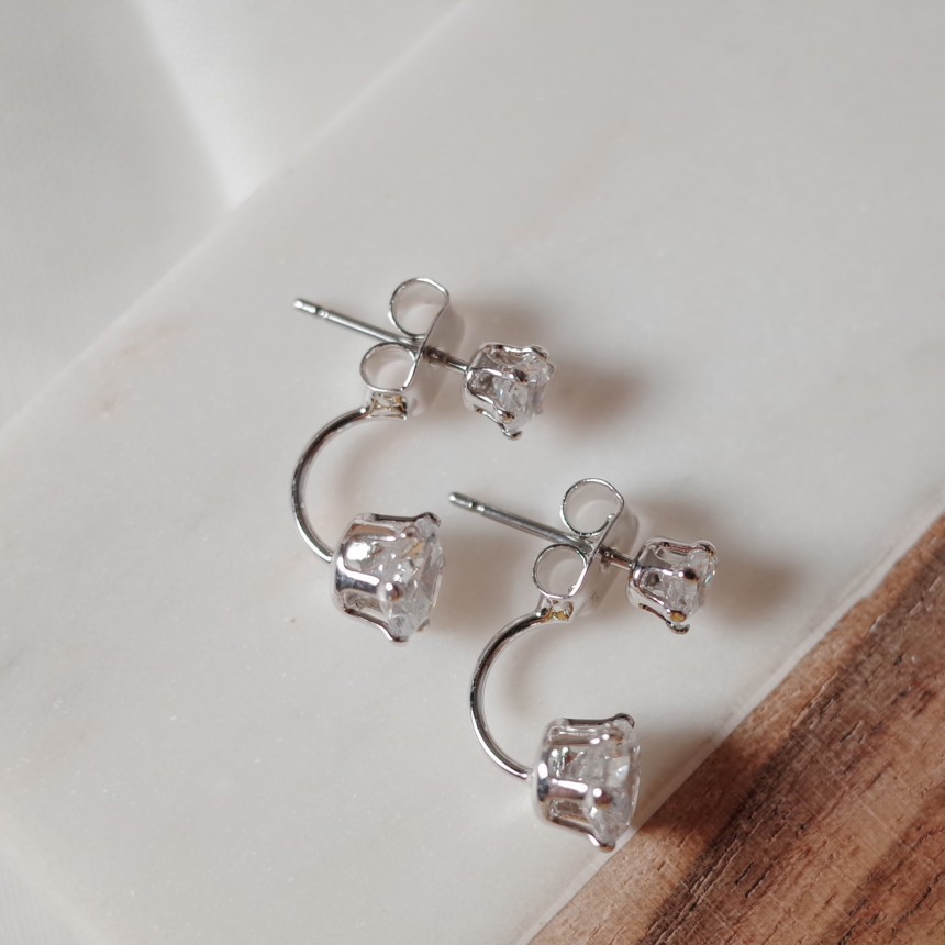 Diseño de nicho de alta gama borla larga sin orejas clip de oreja elegante estilo occidental de las mujeres cara-mirando pequeños nuevos pendientes de moda