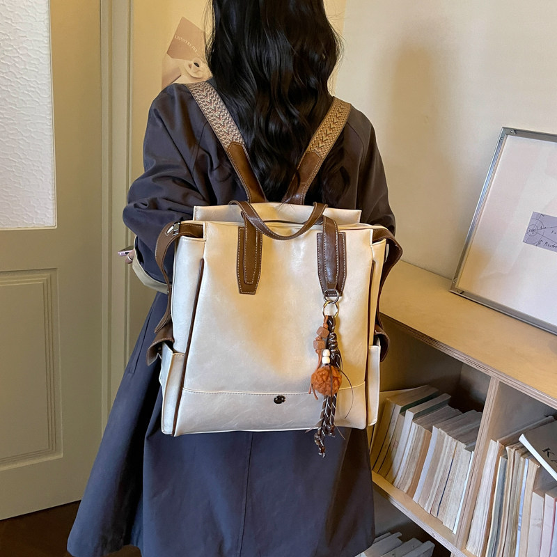 Colegio mochila coreana de gran capacidad 2026 sensación diaria de viaje retro mochila de estilo nuevo estilo mujer