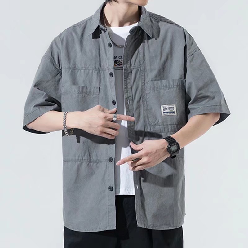 Ropa de trabajo casual Camisa de manga corta de los hombres de verano japonés superior Capa delgada camisa de la marca de moda de una sola pieza de entrega