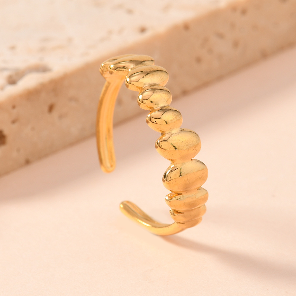 Diseño de moda transfronterizo sentido de joyería de estilo punk personalidad acero inoxidable presión de aceite colmillos dientes titanio anillo abierto de acero