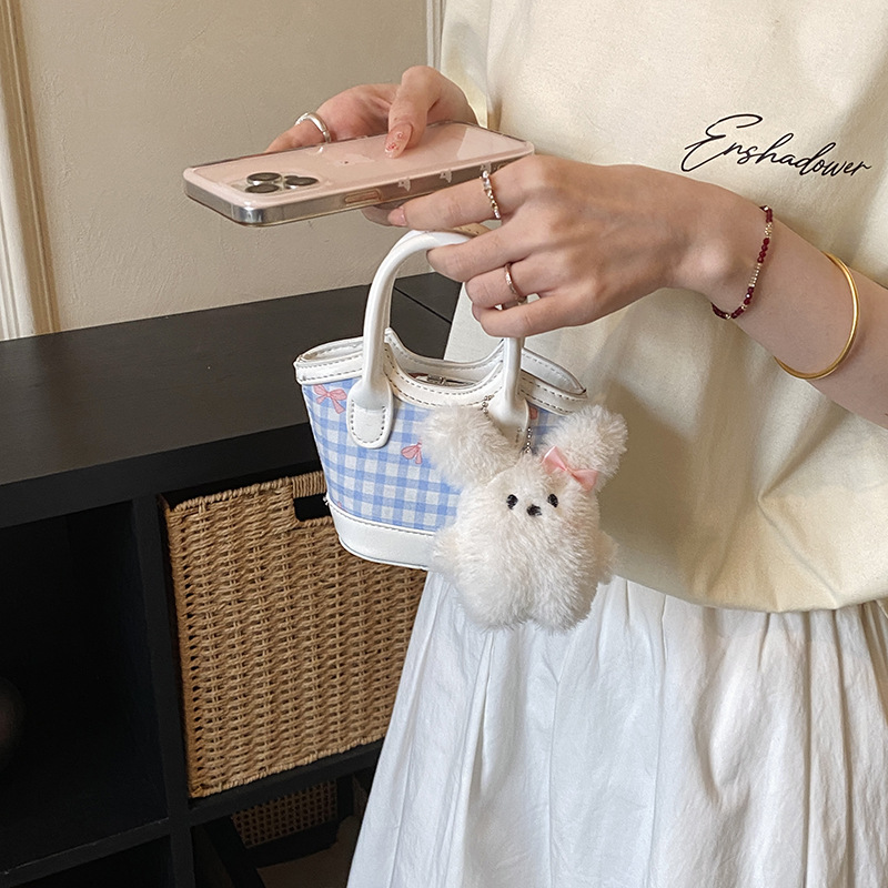 Nuevo tipo de bolso para niños, estilo coreano de moda, bolso de cubo a rejilla, mini bolso de hombro lindo para hombres y mujeres.