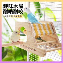 オウム娯楽休憩山小屋よけ屋敷生息小屋鳥の巣鳥テント小屋駅の棒が退屈しておもちゃをかじる