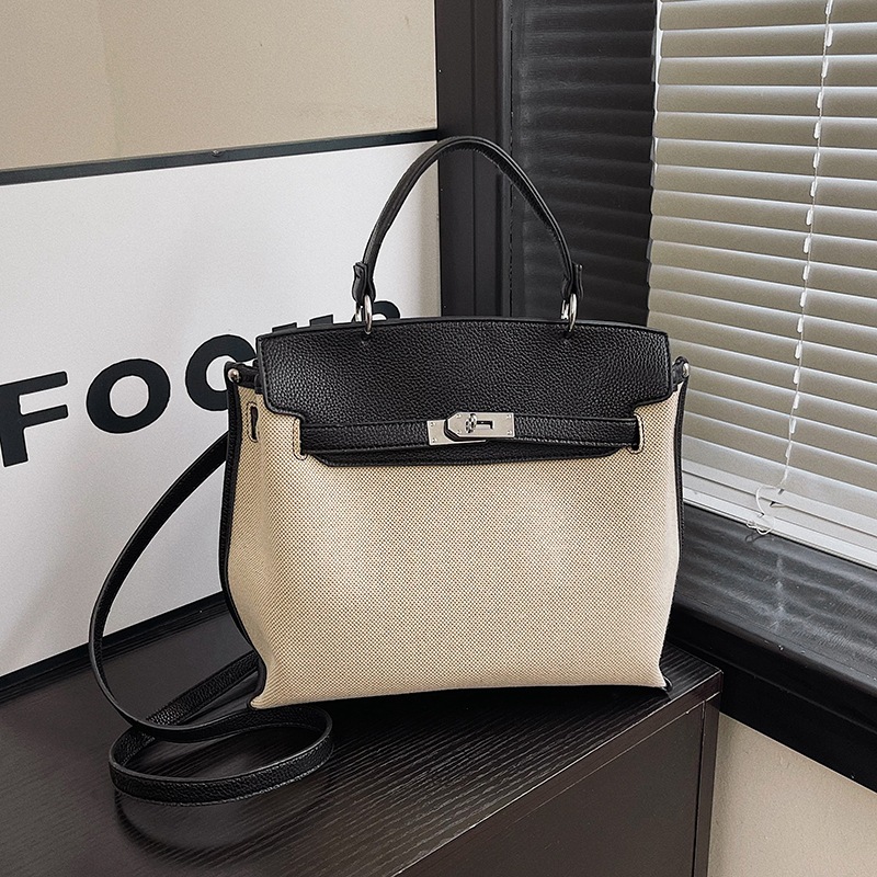 Bolsa de mano transfronteriza para mujeres 2026 nueva tela de lino empalmada color de textura de viaje mochila de hombro