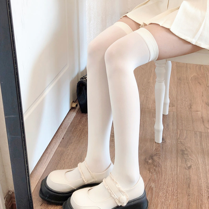 膝の靴下のミルクの白い春夏のストッキングjkの薄いタイプの白いストッキングの圧力のやせている足の高い靴下はやせている美の太ももの靴下を現します。|undefined