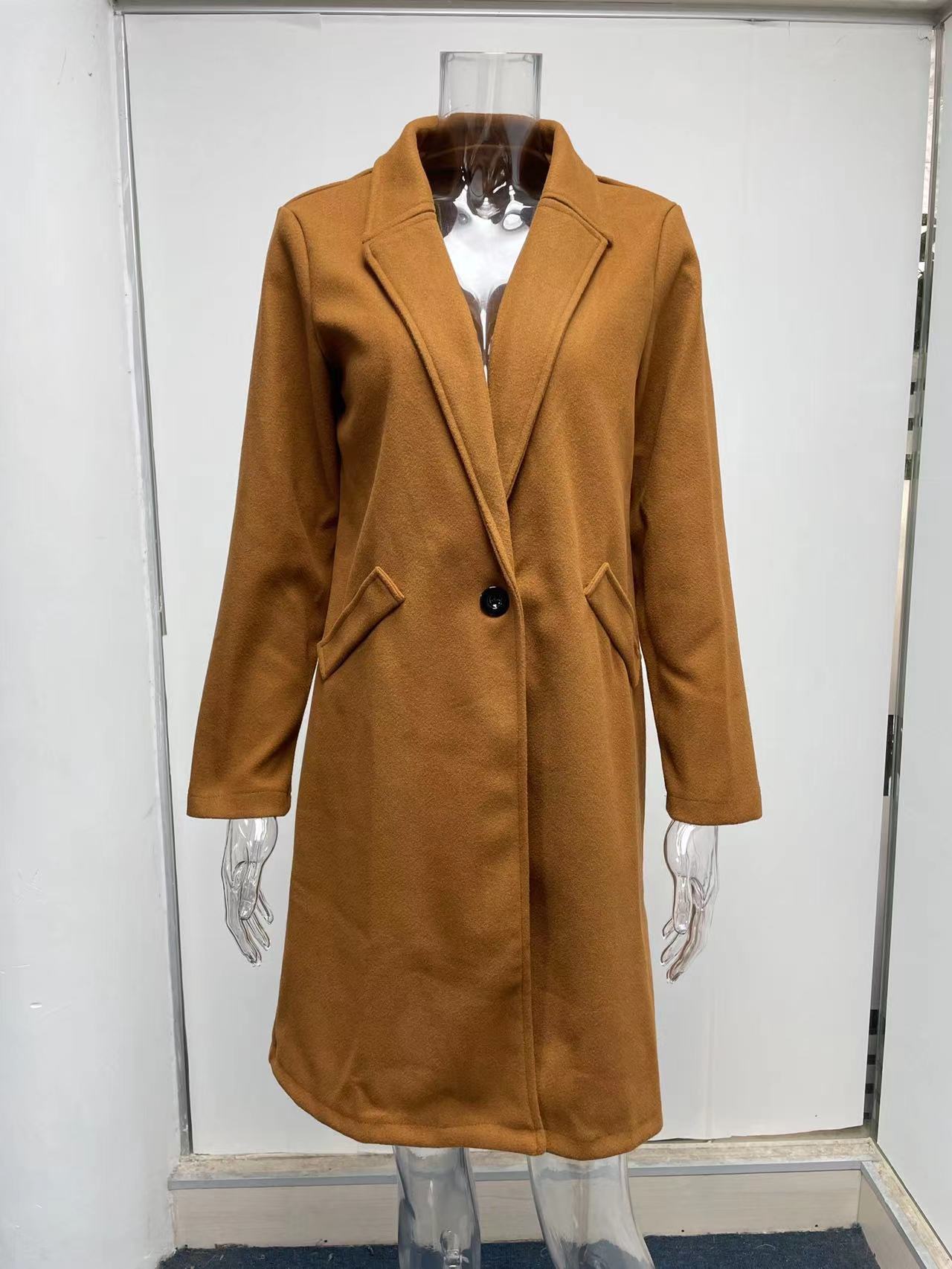 Title 17, Mid-length coat with solid lapels. Classic styl...
