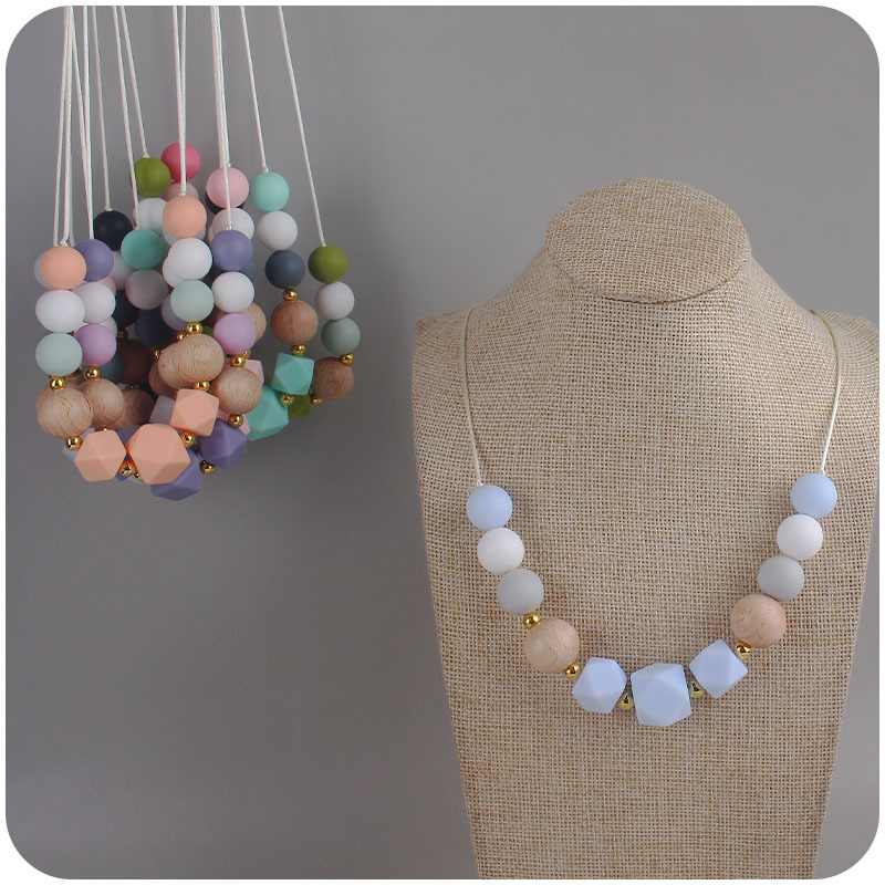 Los nuevos bebés de contraste de color de silicona octogonal mordedor collar de los bebés mordedor palo masticable colgante collar