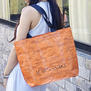 PP woven bag waterproof dustproof bag clothing advertising activities shopping snakeskin hand bag logo